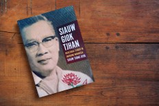 Footsteps in the sand of an emerging nation