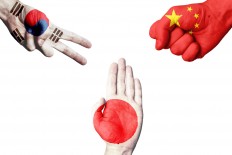 Japan, China, South Korea to discuss lowering roaming fees