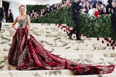 Goddesses, angels and a pope rock Catholic-inspired Met Gala