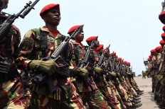 Members of the Indonesian Army Special Forces (Kopassus) march in formation on Oct. 3, 2015 during an exercise at a naval base in Cilegon, West Java. The soldiers were rehearsing for a parade to mark the 70th anniversary of the Indonesian Miliary (TNI) on Oct. 5.