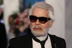 Lagerfeld may drop German citizenship over migrant welcome