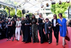 'Let's climb!' Female stars call for equal pay in Cannes protest