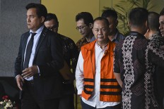 Mengejar debitur besar yang malas membutuhkan lebih dari sekadar tekad politik