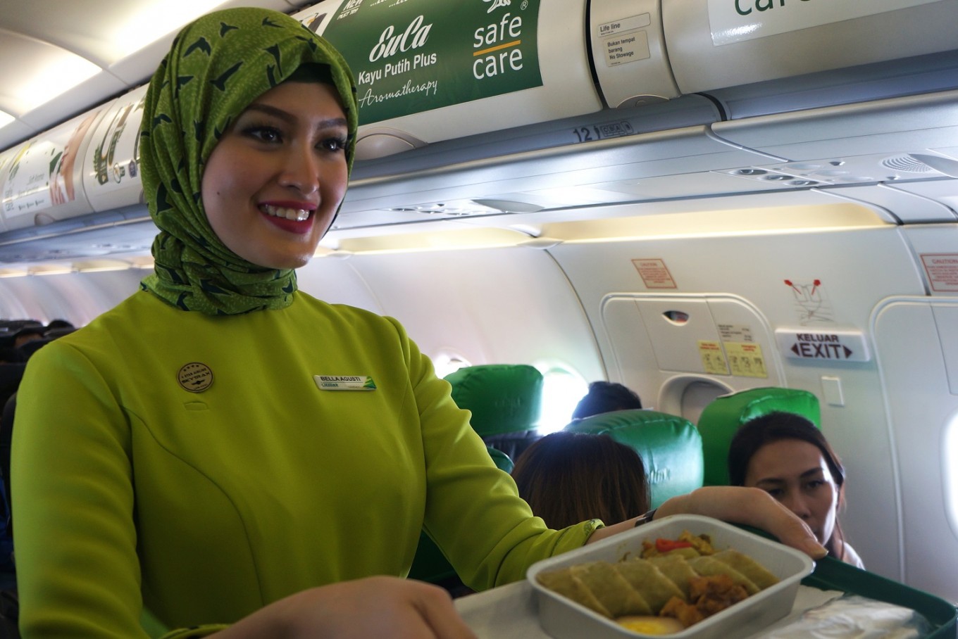 Commentary Hijab Or Tight Skirt Airlines Still Use Womens Body