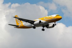 Scoot's Airbus A320-232 from Singapore on short final approaching for landing at Suvarnabhumi International Airport in Bangkok on Aug. 11, 2017.