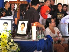 Families of victims of Surabaya bombings cope with deep sadness