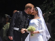 Sealed with a kiss, Harry and Meghan are married