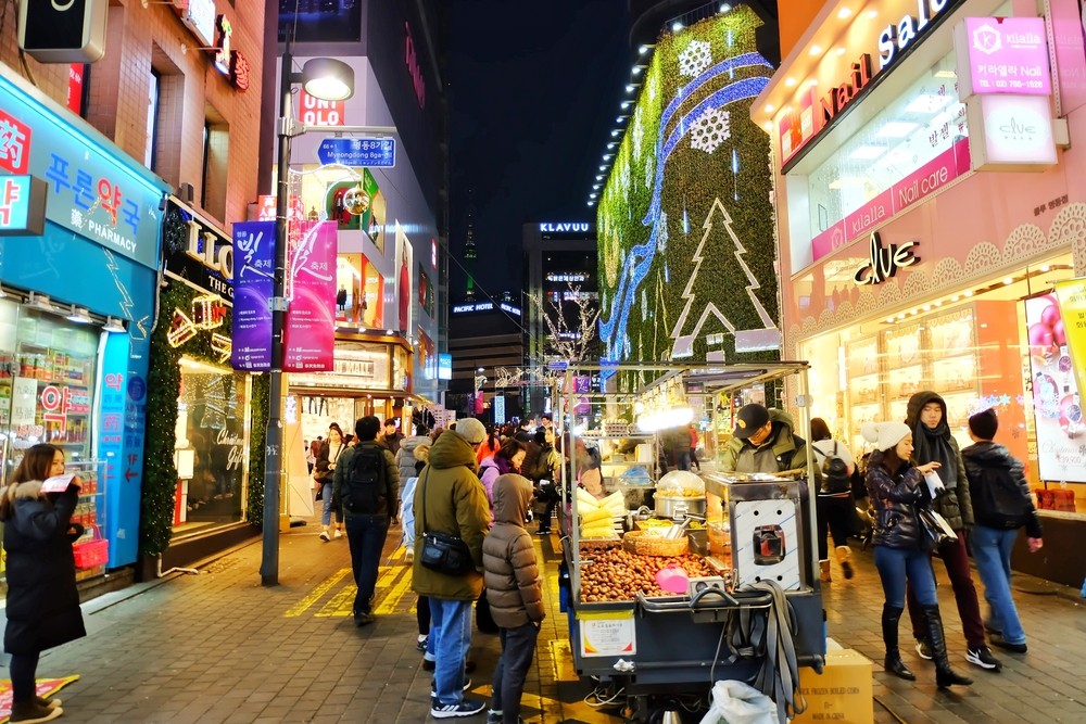 Chinese tourists back in South Korea's Myeongdong shopping district ...