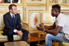 'Hero' Malian who saved child to get French citizenship