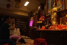 Buddhists flock to temple to celebrate Vesak Day