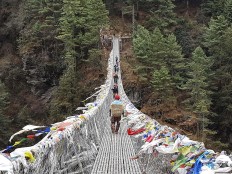 Don't look down: Trekkers must cross numerous high suspension bridges to cross deep valleys. JP/ Adeline Sunarjo