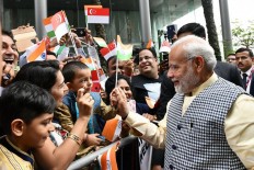 Singapore, India should step into future together: Modi