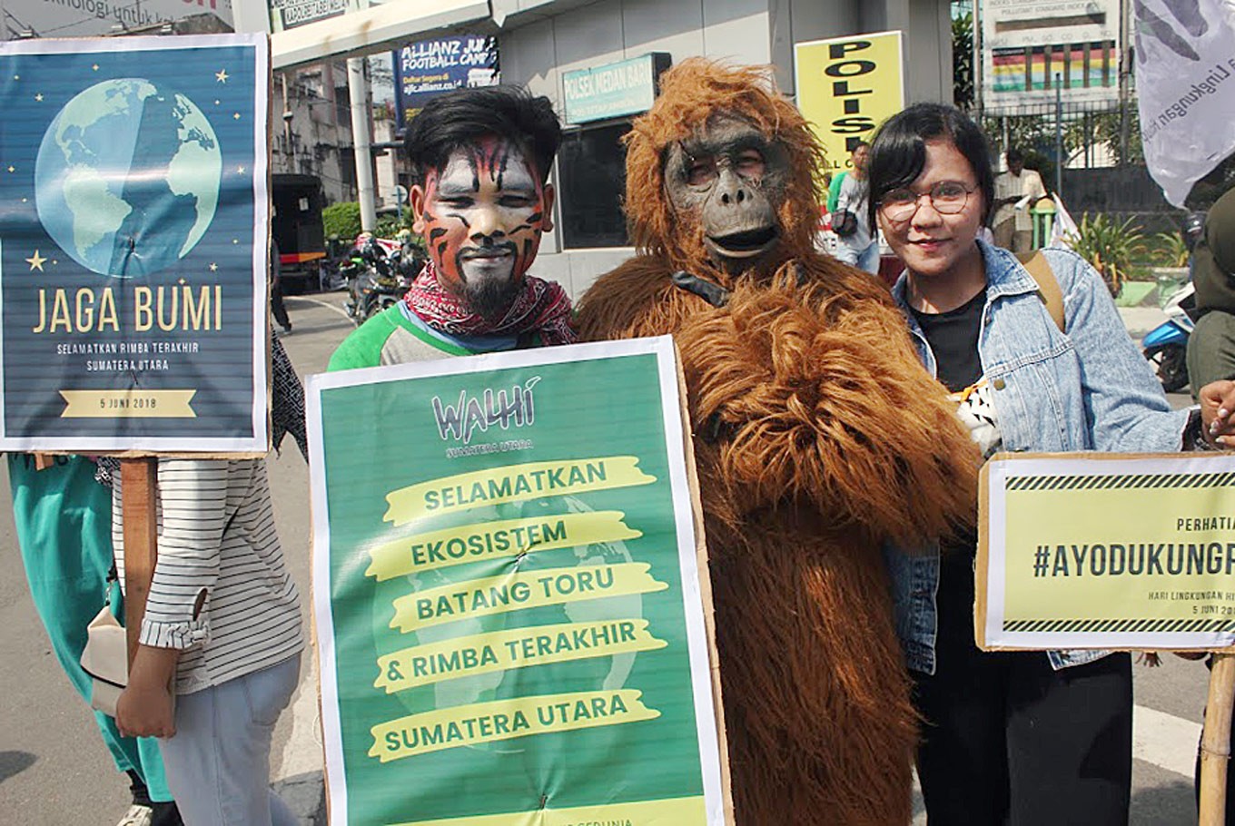 Environmentalists, some dressed in animal costumes and face paint, stage a peaceful rally in Medan, North Sumatra, to commemorate World Environment Day. 