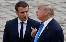 Macron says calls with Trump like sausages: better not know what's inside