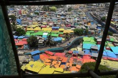 'It looks like new:' Mumbai slums get colorful makeover