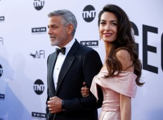 George and Amal Clooney on justice mission for women and gay people