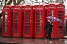 Britain's iconic red phone box reborn as tiny nightclub