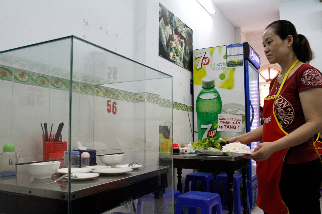 Sadness at Vietnam noodle shop where Bourdain dined with Obama