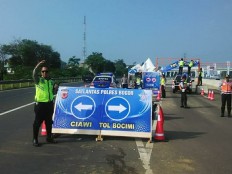 Signs provide direction for drivers on new Bocimi toll road