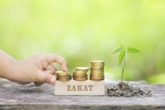 Harmonizing tax and 'zakat'