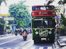 Yogyakarta's double-decker bus helps tourists explore Malioboro