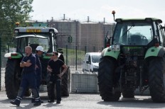 French farmers block refineries over palm oil imports