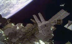 NASA astronauts install high-def cameras during spacewalk