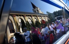 Muslims find a place to pray in front of the Immanuel Protestant Church (GPIB) on June 15, 2018 in Malang, East Java. The church has always opened its doors to Muslims during Idul Fitri. JP/ Aman Rochman