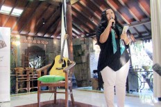 Wiji Thukul's daughter heals tragedy with poetry