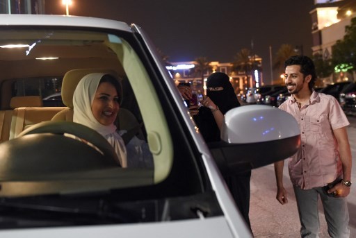 At midnight, Riyadh erupts in cheers for a woman in a car