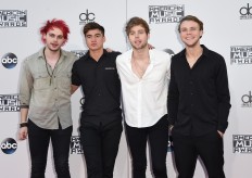 Australian rockers end Jay-Z, Beyonce No. 1 debut streak