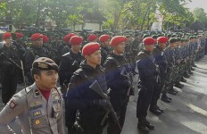 Hundreds of Surakarta Police personnel attend a call for readiness ceremony in Central Java in 2018.
