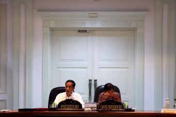 President Joko "Jokowi" Widodo (left) and Vice President Jusuf Kalla.