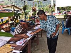 Traditional dress brighten up Papua polling station