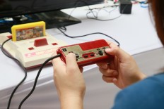 Nintendo resumes sales of palm-sized 'Famicom' console