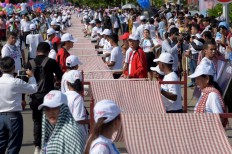 Cambodia earns Guinness Record for longest woven scarf
