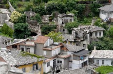 Steeped in history but crumbling, Albania's 'slanted city'