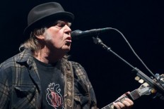Rocker Neil Young calls Trump 'a disgrace', backs Sanders