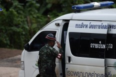  11 out of Thai cave, hopes rise all will survive 