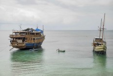 Indonesia's traditional boat builders reach into the past