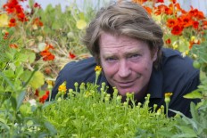 British microgreens grower Chris Kilner poses in his vegetable farm in Saint-Jean-en-Val on May 22, 2018. 