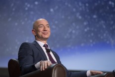 Jeff Bezos becomes richest man in modern history, topping $150 billion