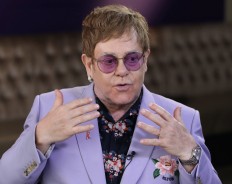 A day in Elton John's life: Buy Rolls, write hit song, dine with Ringo