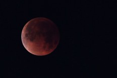 Red planet and 'blood moon' pair up to dazzle skygazers
