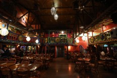 Amigos in Kemang Club Villas, South Jakarta, offers Tex-Mex (Texan and Mexican) cuisine, a fusion of Mexican and American flavors served inside its uniquely decorated interior featuring Mexican-themed murals and colorful decor. 