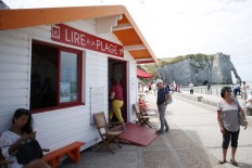 Holiday reads: Beachgoers check out French seaside libraries