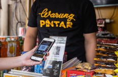 Warung Pintar introduces cashless payment service 
