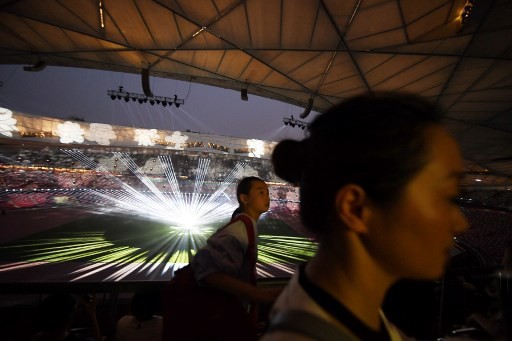 A decade on, Olympics changed China, but not how many hoped