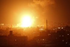 Wave of Israeli strikes hit Gaza after rocket barrage, toddler killed