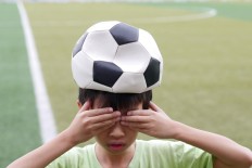 "No child under the age of 18 should be heading the ball in soccer," said the 49-year-old Nigeria-born naturalised American.